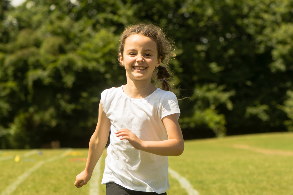 A girl running on a track